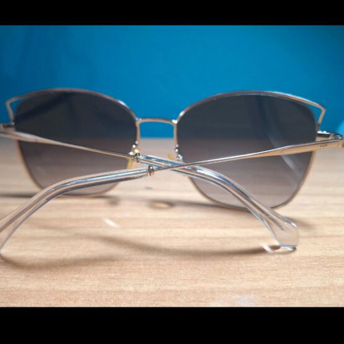 Mati Mati Lük sunglasses like new, white and brown