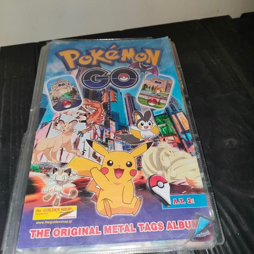 Pokemon GO The Original Metal Tags Album like new with 270 metal tags