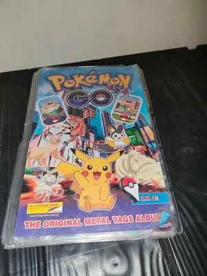 Pokemon GO The Original Metal Tags Album like new with 270 metal tags