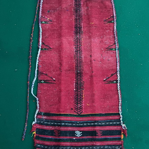 Red striped traditional costume apron used with wear