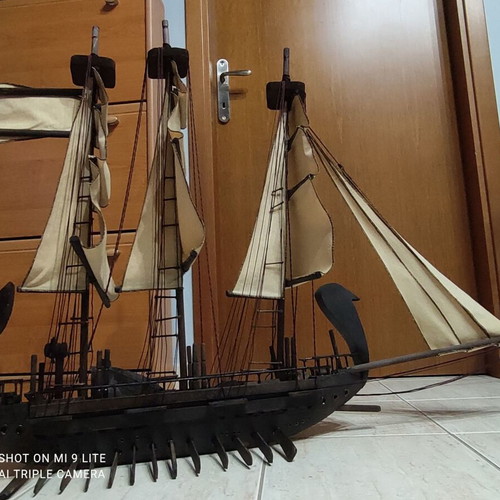 Handmade wooden sailboat used