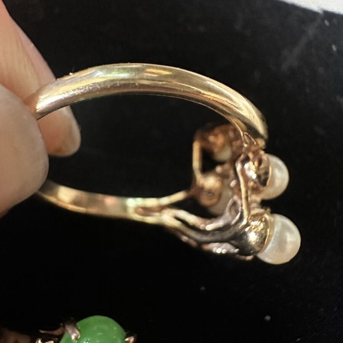 Vintage gold rings set used with pearls and green stone