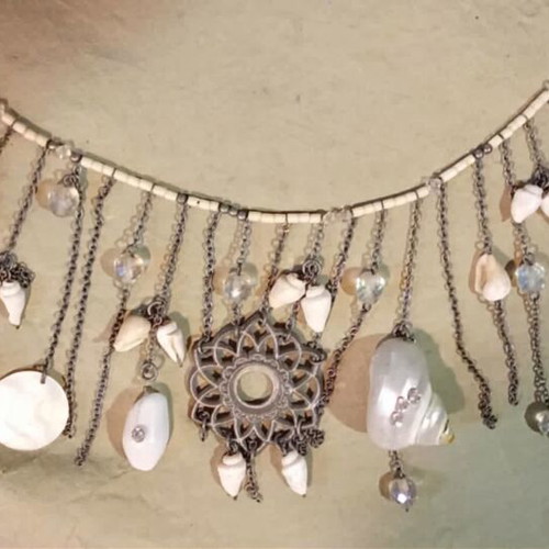 Accessorize necklace new with mother of pearl, shells, crystals, and metal details