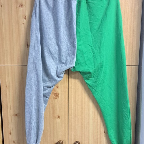 Two-tone sweatpants used, gray and green with metallic buttons, size XL