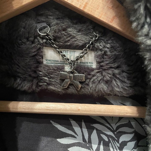 Faux fur gray small like new with design on sleeve and shoulders
