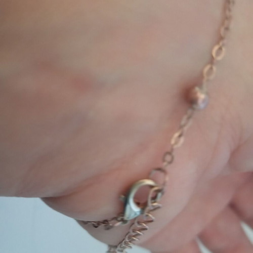 Rose gold bracelet with flower charm, 24 cm