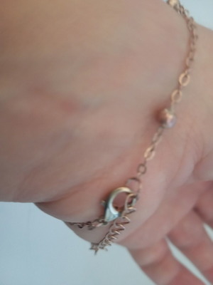 Rose gold bracelet with flower charm, 24 cm