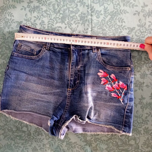 Women's denim shorts medium with embroidered flowers used, blue