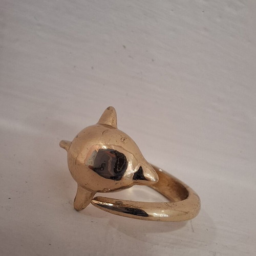 Dolphin ring used, gold color