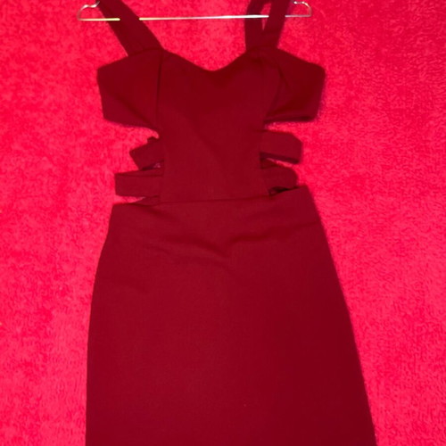 Red mini dress like new, fitted with cutouts and bust support