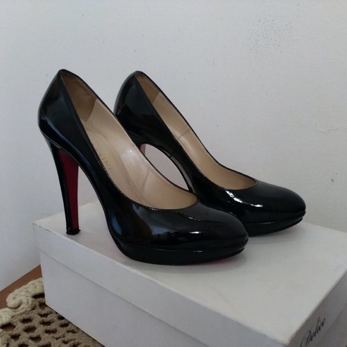 Patent leather pumps used size 37, leather with red sole