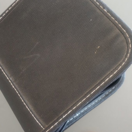CD case with 20 used CDs of various Greek dances