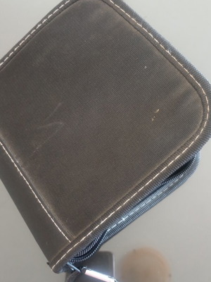 CD case with 20 used CDs of various Greek dances