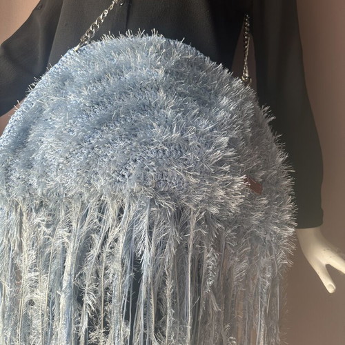 Handmade knitted shoulder bag turquoise with fringes and fluffy texture