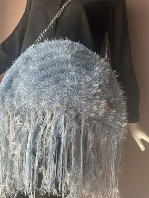 Handmade knitted shoulder bag turquoise with fringes and fluffy texture