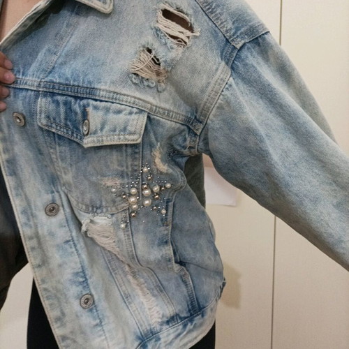 Denim jacket like new with rips, pearls and rhinestones