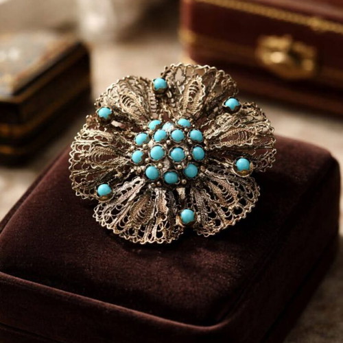 Vintage silver brooch used with turquoise stones