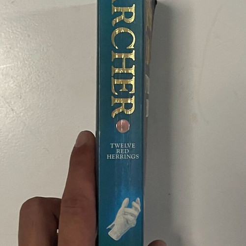 Twelve Red Herrings by Jeffrey Archer paperback like new