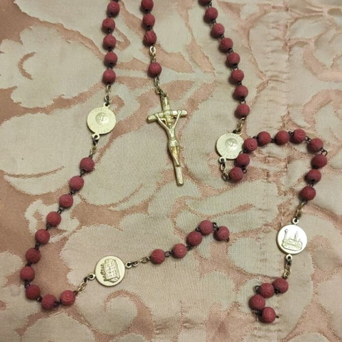 Rosary like new, red with gold color