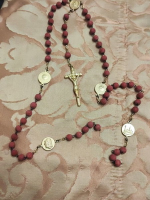 Rosary like new, red with gold color