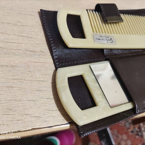 Comb and mirror in leather case like new