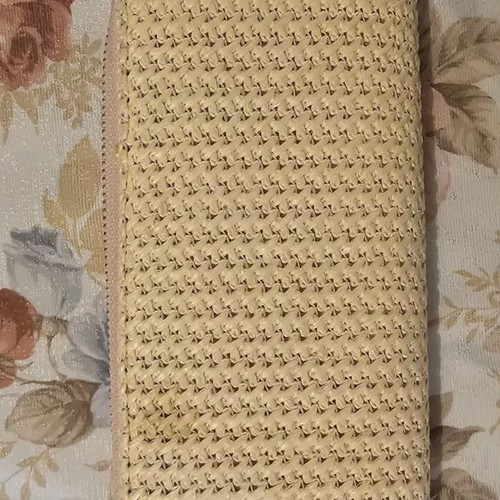 Pink straw wallet used with multiple card slots
