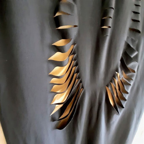Black dress with beige lining and cutouts by Zero Waist Daniel