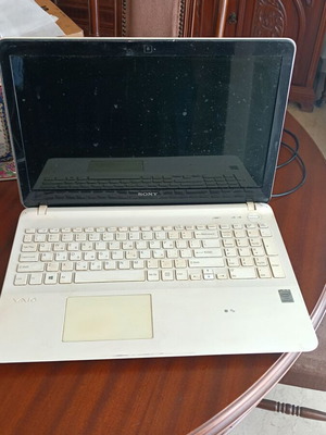 Sony Vaio laptop used, model SVF153B1YM with original charger and battery