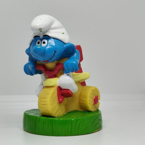 Smurf collectible figure on bicycle handmade Peyo like new