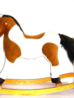 Rocking horse used on wooden base