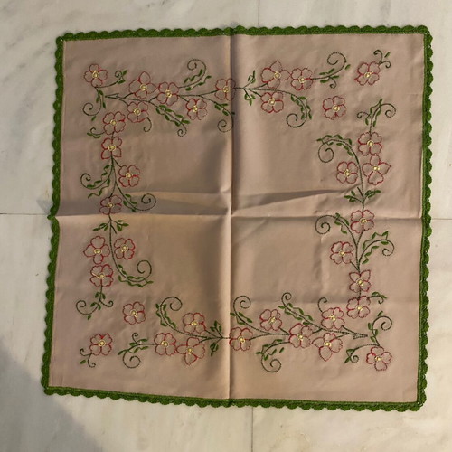 Handmade table linen with embroidery and lace used