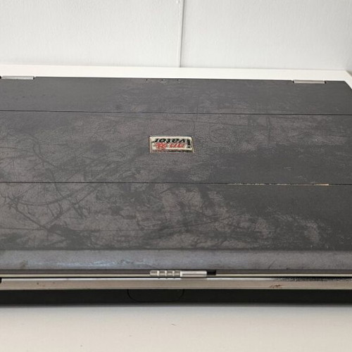 Innovator DX8000 laptop used for spare parts, no charger, faulty