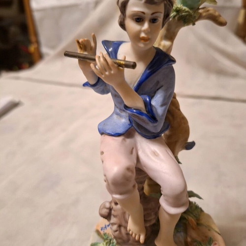 Capodimonte porcelain boy with flute like new with artist signature