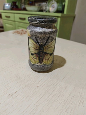 Glass jar with marble effect and butterfly design like new