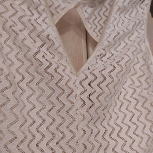 Blouse almost like new with transparency and back opening, size M, white