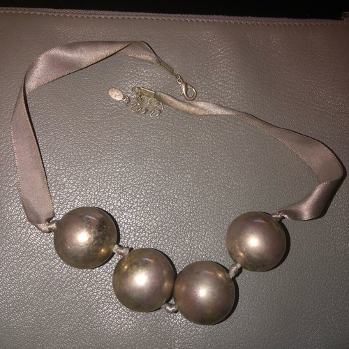 Necklace with silver beads on gray satin ribbon used