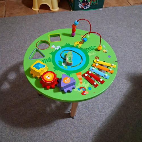 Wooden activity table used for preschool children