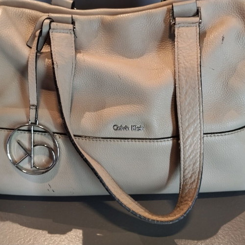 Calvin Klein beige handbag used with ample storage space