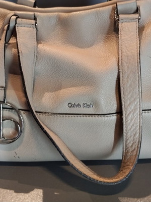 Calvin Klein beige handbag used with ample storage space