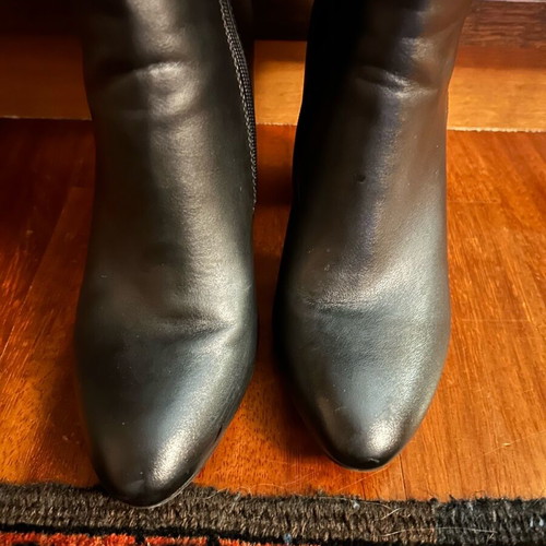 Black high boots made of smooth synthetic leather like new, size 38