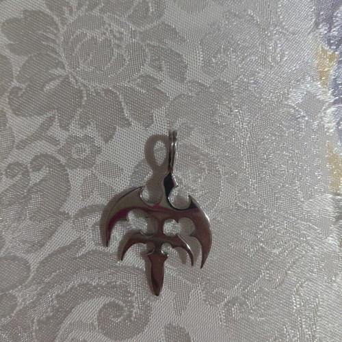 Rock charm silver like new