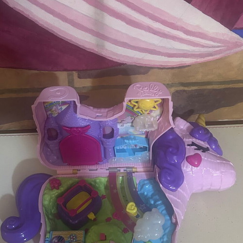 Polly Pocket Unicorn Party Playset used by Mattel