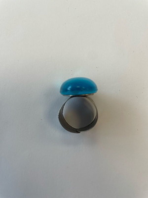 Statement ring with adjustable oval blue stone used