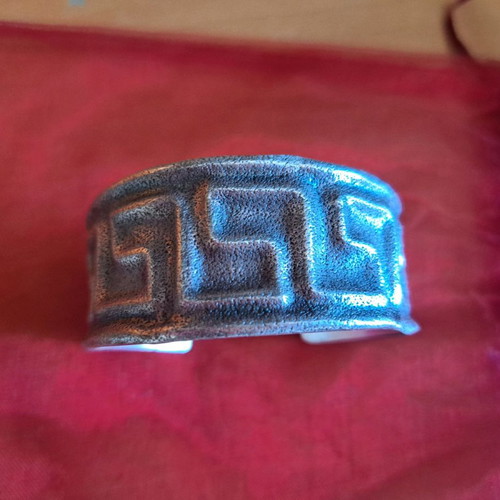 Silver bracelet with meanders like new, hammered design