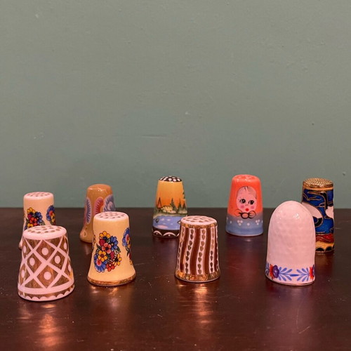 Set of 9 porcelain thimbles like new, collectible