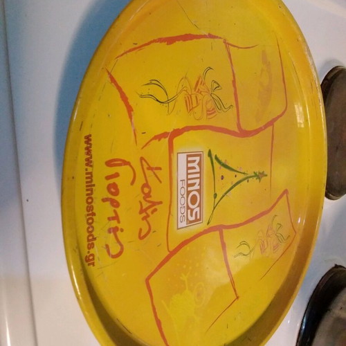 Collectible metal tray new, from another era