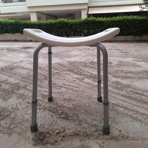 Adjustable Bathroom Stool like new with ergonomic plastic seat and aluminum frame