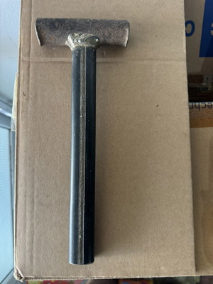 Old handmade iron hammer