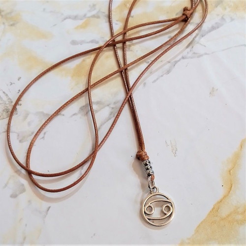 Men's pendant with Cancer zodiac and brown snake cord, new