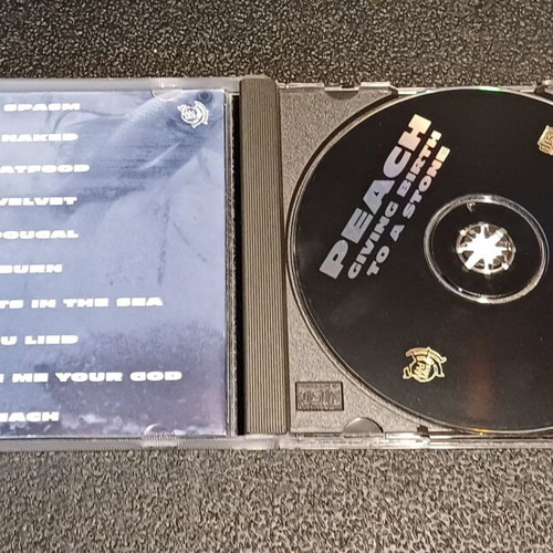 Peach Giving Birth To A Stone CD used, progressive metal